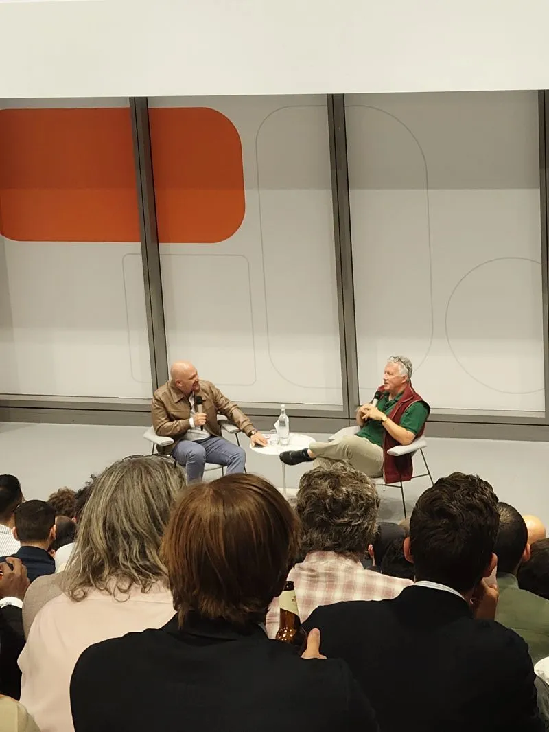 Amjad Masad and Paul Graham speaking at Replit London